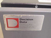 Decision Data Computer Corporation logo plate on gray cabinet door — Decision Data branding closeup