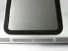 Apple iMac 27-inch MB952LL/A — bottom edge showing regulatory markings, ventilation grille, and FCC/CE certification labels