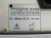 Close-up of Imagine Eyes AI-Mirao 52-d rear label showing brand, address (Orsay, France), model AI-Mirao 52-d, SN/0005, and 2005 manufacture date