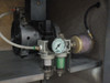 Z510 internal compressor and Numatics air regulator filter assembly visible beneath base cabinet