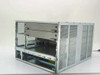 Sun Microsystems 270-4944-01 empty server chassis — rear three-quarter view showing open drive bays, empty card slots, and mesh enclosure panels