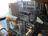 Preco slitter slitting section – foil roll feeding through machine with Allen-Bradley touch screen panel visible at right