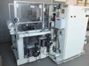 Preco slitter rear three-quarter view – multiple drive motors, wiring, and electrical subpanel visible on frame