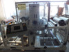 Preco coil slitter front angle – touch screen HMI panel, slitter section with Tidland knife assembly and rewind rollers