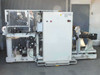 Preco coil slitter full machine overview – left side showing slitter section, control cabinet, and rewind arm