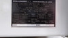 Daikin UBRPD5A-2 Brine Chiller – close-up of rating plate showing model UBRPD5A-2, 200-220V 3-phase 50/60Hz main power, R407C refrigerant 1.9kg, design pressures, CH1 and CH2 current ratings, Made in Japan