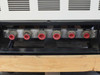 Affinity CWA-100K-MP21CB chiller – bottom fluid connection manifold showing six red-capped ports with engraved labels including Supply and Return