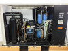 Affinity CWA-100K-MP21CB chiller – interior view showing Copeland compressor, refrigerant vessels, blue water filter canisters, and plumbing