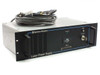 Spectra-Physics R2-740 Laser Power Supply front panel view showing Emission LED, ENM hour meter, J1 Remote D-sub connector, and included cable coiled on top