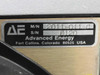 Advanced Energy MDX 2011-011-C front panel with dual digital displays, KW/Volts/Amps readouts, status indicator LEDs, and Emergency Stop button