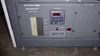 ElectronCure 30X control electronics panel – front panel showing floppy drive, vacuum gauge display, control indicators, power switches, and dose controls