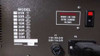 ElectronCure 30X model selection plate – rear label showing model variants (01R through 30N), with 30R (30kV, 33.3mA) checked; fuse ratings F1: 115V 20A or 230V 15A visible
