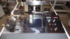 ElectronCure 30X top deck – alternate angle showing stainless steel work surface, wafer stage, control panel area, and safety interlock components