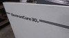 ElectronCure 30X nameplate close-up – 'ElectronCure 30x' model designation printed on white cabinet side panel