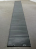 Xunlight XRS19-158 158W flexible solar panel laid flat unrolled showing full length and J-Box connectors at one end