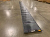 Xunlight XRS19-158 flexible amorphous solar panel laid flat full length on warehouse floor showing 19-cell array