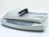 HP Scanjet 4500C C9910A flatbed scanner with C9915A ADF attachment closed — three-quarter front view showing front panel buttons and ADF unit seated on top