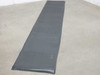Xunlight XRS10-83 flexible solar laminate panel laid flat on floor showing full 118-inch length and cell layout
