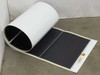 Xunlight XRS8-66 66W flexible amorphous solar panel partially unrolled on floor showing black cell array and white backing