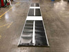 Xunlight XRS5-42 42W flexible amorphous solar panels — full group of six panels laid flat on warehouse floor, untrimmed sheet view from above