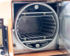 Tegal PlasmaLine 200 barrel etch chamber interior — open door view showing cylindrical quartz barrel and horizontal wafer rack/boat