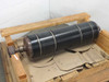 47-inch heavy-duty industrial press roll with four circumferential banding rings, resting on a wooden pallet — full length side view