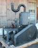 Beach Russ 615-325 vacuum pump — left-side full view showing flanged inlet port, drive motor, belt guard, oil separator tank, and S-curve exhaust
