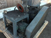 Beach Russ 615-325 vacuum pump — right-side view showing large red-faced flanged suction inlet, motor, belt guard grille, and pallet