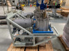 Riber Jet 40K selenium cracker source body close-up showing stainless steel vacuum vessel, flanges, blue mounting base, and associated vacuum hardware