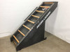 Jacobs Ladder commercial stair climber — side profile view showing full 40% incline angle, wood rungs, and frame structure