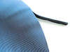 Quanex Solargain butyl edge tape roll close-up showing blue release liner and black butyl edge