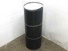 SoloPower SP3L-220 flexible solar panel rolled into a cylinder and standing upright against white wall, demonstrating the panel's flexible and rollable nature