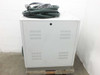 Amtec XRF 940V main cabinet rear/side view with ventilation louvers and green flexible conduit on top