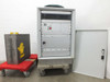 Amtec XRF 940V main cabinet open showing internal rack-mounted electronics, control panel with red emergency stop button