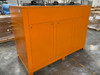 Deltatherm RKV 11.2 orange chiller front view with control panel, red E-stop, and pressure gauge on front face