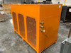 Deltatherm RKV 11.2 orange chiller three-quarter front view with condenser fans visible on top and side service panels