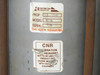 Semicoa Semiconductors asset label on weld head column showing Property 03-100, Model N/A, Serial N/A, with CNR Calibration Required warning sticker