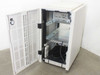 HP C2785A rack enclosure interior — door open showing upper server chassis with drive bays, internal cabling, and lower power supply or module area