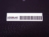 Uni-Solar United Solar Ovonic brand label and barcode on dark panel surface