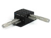 Newport 460P-X XY stacked linear stage pair with SM-25 micrometers — 3/4 front-right view showing both micrometer knurled thimbles and stacked stage assembly