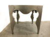 Artistica Van Cleef 125-260 – straight-on apron and leg detail view showing carved Moroccan-style cutout apron and tapered legs with white brass finish