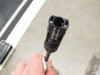 MC4 connector key tool held up — shows locking/unlocking key used with SP3L-180 MC4 connectors, with directional arrows indicating lock and unlock