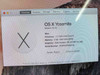 Apple iMac About This Mac screen showing OS X Yosemite 10.10, 2.7 GHz Intel Core i5, 4 GB 1333 MHz DDR3, AMD Radeon HD 6770M 512 MB