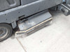 Nilfisk-Advance 3800 – detached front squeegee/deflector blade assembly shown on ground, showing wear and residue