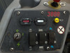 Nilfisk-Advance 3800 operator control panel – Curtis charge meter, hour meter (~1035 hrs), toggle switches, key switch, and warning indicators