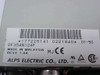 Alps Electric DF354N124F label closeup showing model number, DC 5V 1.0A power rating, Made in Malaysia, and UL/CE/CSA/TUV certifications