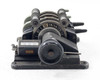 Moviola SYB film synchronizer – front view showing dual sprocket gangs, numbered frame-count dial, 4-digit Veeder-Root counter, and hand crank