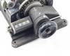 Moviola SYB synchronizer – close-up of 4-digit Veeder-Root counter reading 5555 and hand crank knob with paint chips visible on housing