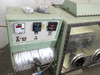 Vacuum Atmospheres glove box control panel – showing Granville-Phillips 6008 vacuum gauge, SI Technologies digital timer, and Omega temperature controller with power switches