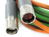 Servo cable connector ends — close-up of mating circular connectors showing power and feedback pin arrangements